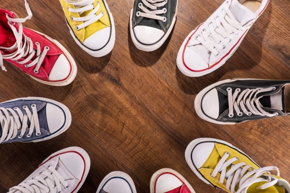 colorful shoes pointed inward in a circle